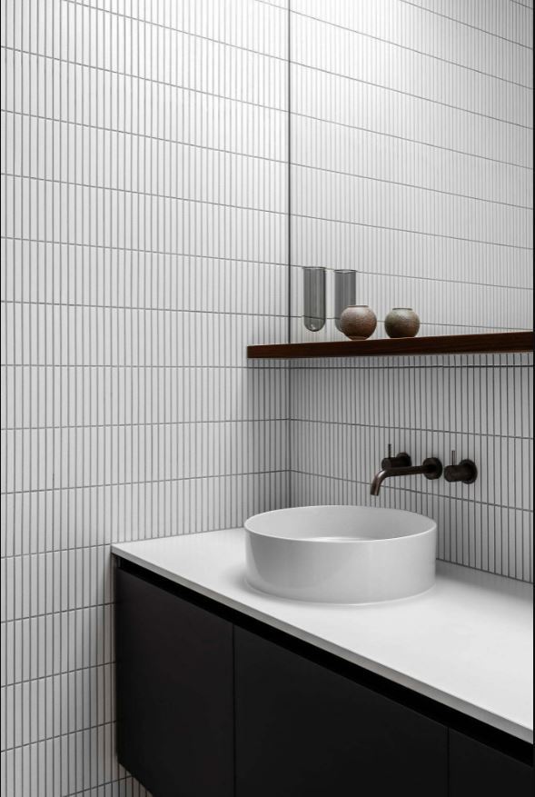 White Kit-Kat tiles on a bathroom wall