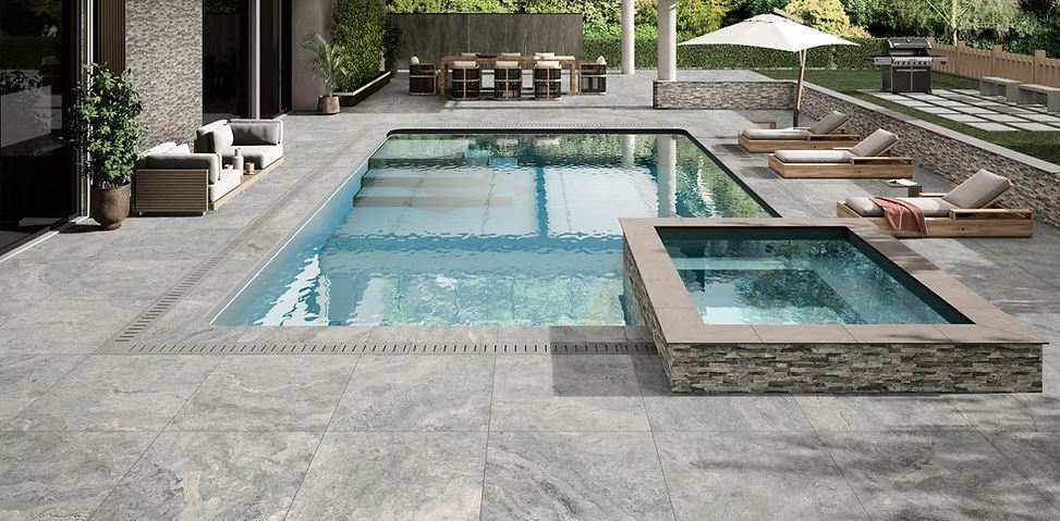 Travertino Pearl Porcelain Paver around a swimming pool